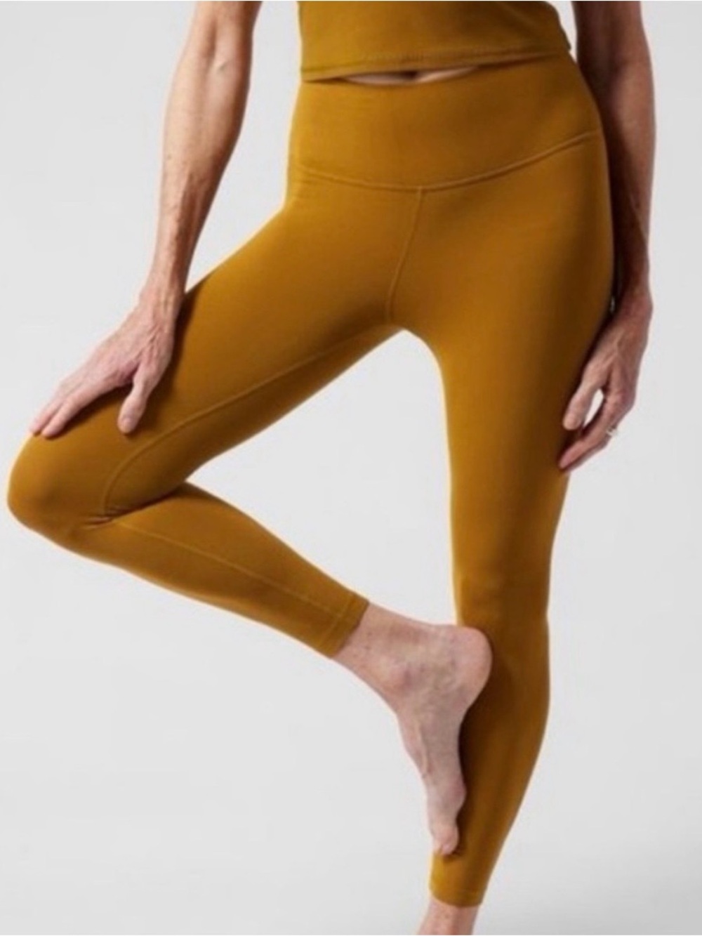 Athleta Transcend 7/8 High-Waist Leggings in Brass. Size XS